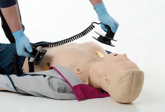 Тренажер для взаємодії з ручним дефібрилятором Laerdal Resusci Anne Simulator Paddle, IV Arm Right + SimPad Plus